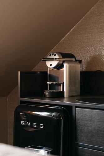 ホテル ブリタニックにあるキッチンまたは簡易キッチン