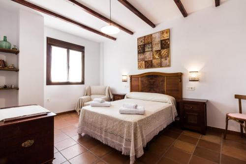Ένα ή περισσότερα κρεβάτια σε δωμάτιο στο Casa lorenzo