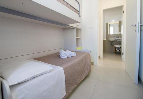 Posteľ alebo postele v izbe v ubytovaní Holiday Onde di Sicilia