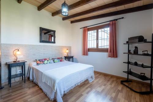 Un pat sau paturi într-o cameră la Villa Sa Caseta des Padrí 053 by Mallorca Charme