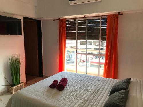 Katil atau katil-katil dalam bilik di Cares Apartament, Morón, Buenos Aires