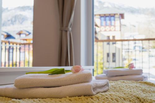 Postel nebo postele na pokoji v ubytování Apartmán Hory - V srdci Tatier