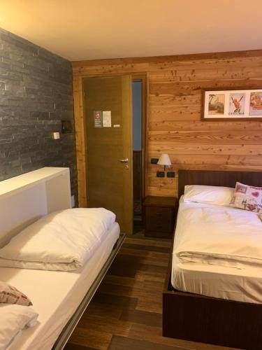 Cama o camas de una habitación en Hosquet Lodge