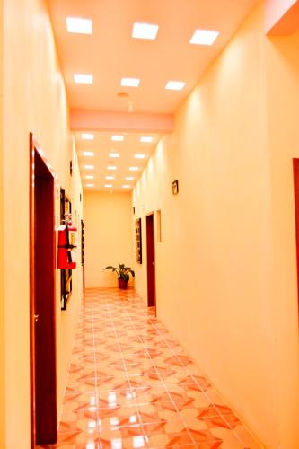a hallway of a hospital with a tile floor at HOTEL EDELMIRA in Comitán de Domínguez