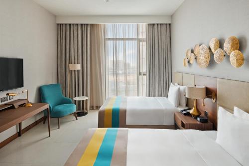 Afbeelding uit fotogalerij van Holiday Inn Dubai Al-Maktoum Airport, an IHG Hotel in Dubai