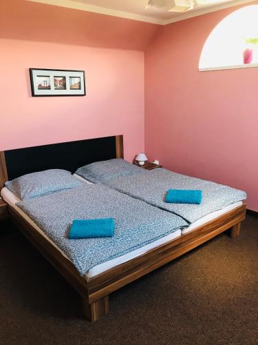 Ein Bett oder Betten in einem Zimmer der Unterkunft Cyklonocleh