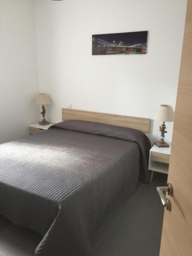 En eller flere senge i et værelse på VILLAS MATTEU