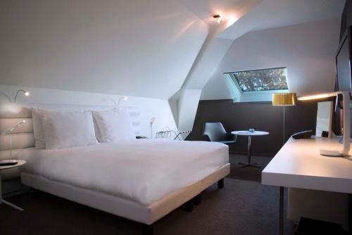 Katil atau katil-katil dalam bilik di Radisson BLU Hotel Nantes