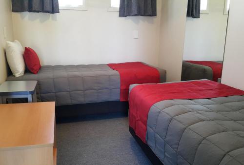 Letto o letti in una camera di Avon City Motel