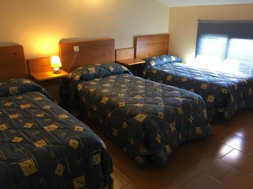 Katil atau katil-katil dalam bilik di B&B Yeguada La Parrilla