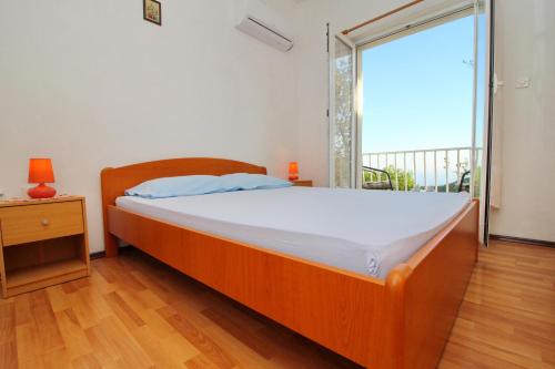 Postel nebo postele na pokoji v ubytování Apartments Felix
