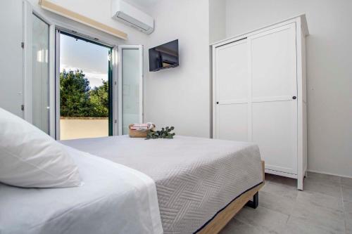 Posteľ alebo postele v izbe v ubytovaní Domus Lux Houses by Konnect