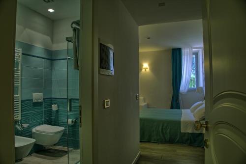 Kylpyhuone majoituspaikassa Hotel Palazzo Bello