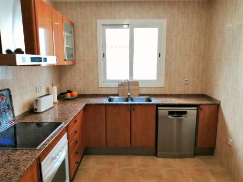 Η κουζίνα ή μικρή κουζίνα στο VILLA DIPLOMADO (RELAX EN EL PARAISO)