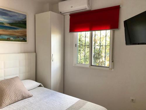 Postel nebo postele na pokoji v ubytování Apartamento Triana II Bolonia, Tarifa