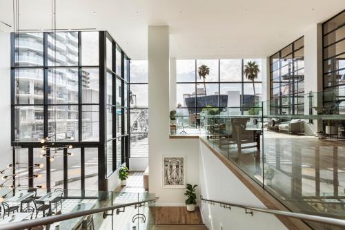 an office building with glass floors and windows at Kimpton Everly Hotel Hollywood by IHG in Los Angeles