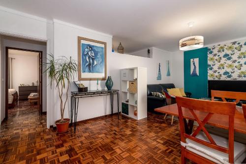 a living room with a couch and a table at Senna Apartment in Lisbon