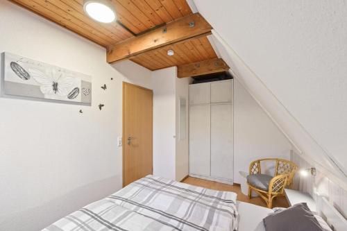 Ένα ή περισσότερα κρεβάτια σε δωμάτιο στο Ferienhaus Hannah 100