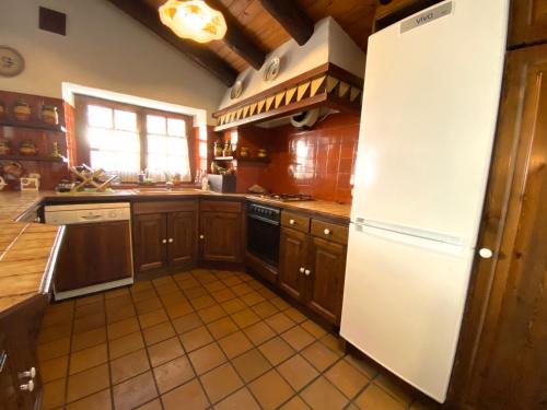 Η κουζίνα ή μικρή κουζίνα στο C5 Bordes d'Arinsal, Duplex Rustico con chimenea, Arinsal, zona vallnord