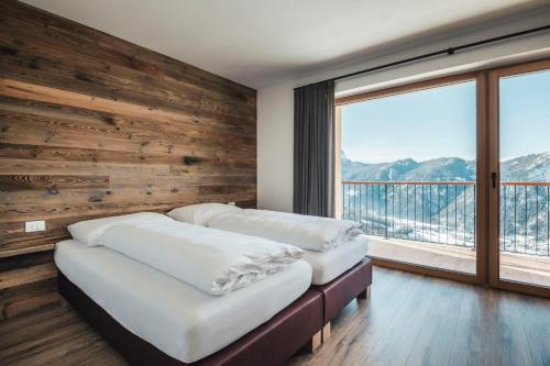 Кровать или кровати в номере Sartu Apartments