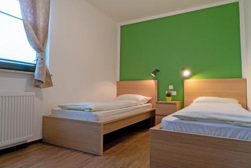 Postelja oz. postelje v sobi nastanitve Apartments Helena Kranjska Gora