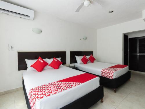 OYO Hotel Puesta del Sol, Santa Ana, Campeche 객실 침대