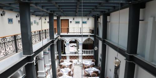 an overhead view of a room with tables and chairs at Mansion Azul Cholula in Cholula