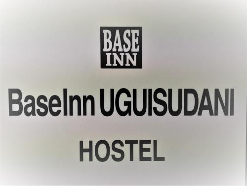 a sign that says base inn in berlin ukrainian hospital at Base Inn Uguisudani in Tokyo
