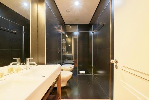 Ένα μπάνιο στο Lisbon Five Stars Apartments São Paulo 55