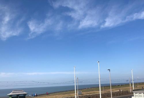 a view of the ocean from the beach at The Fossil Tree Hotel in Blackpool