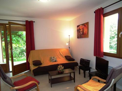 Ruang duduk di Comfortable house with terrace in south Dordogne