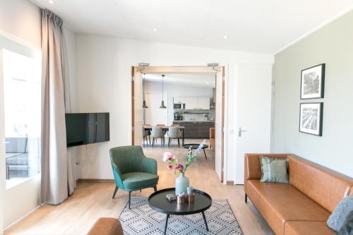 Et opholdsområde på 14p Luxe bungalow met serre