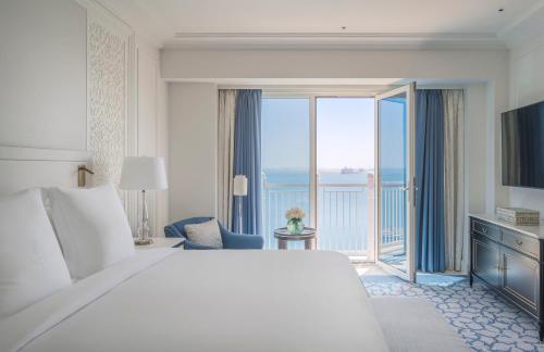 Krevet ili kreveti u jedinici u okviru objekta Four Seasons Hotel Doha