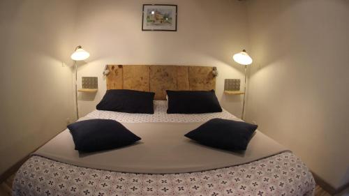 Кровать или кровати в номере Le Clos du Barry