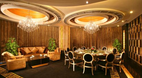 Χώρος καθιστικού στο Rainbird Hotel