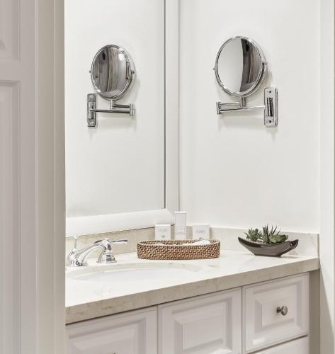 a bathroom with a sink and a mirror at Arizona Grand Resort in Phoenix
