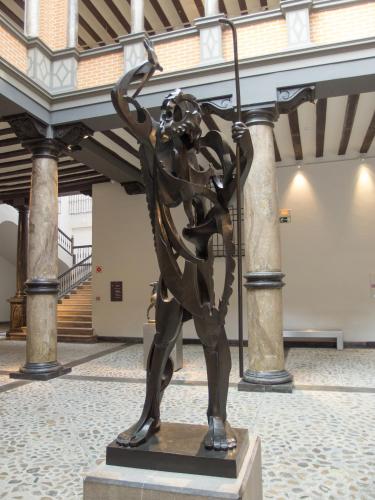 a statue of a woman holding a pole in a building at MODERNO NUEVO Luminoso WI-FI PLAZA DEL PILAR 2 in Zaragoza