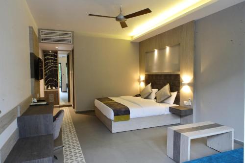 Ένα ή περισσότερα κρεβάτια σε δωμάτιο στο Kingston Resort