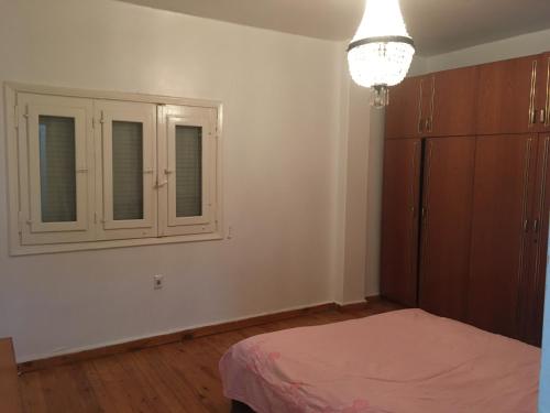 Llit o llits en una habitació de Nasr City