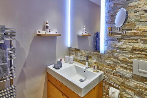 Een badkamer bij Aspen Alpine Lifestyle Hotel