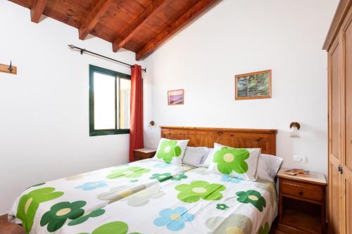 En eller flere senge i et værelse på Home2Book Stunning View La Era de Hermigua & Wifi