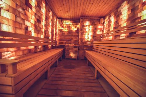 a row of benches in a sauna at Hotel Spa Ice Resort in Timişoara
