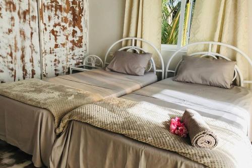 Ένα ή περισσότερα κρεβάτια σε δωμάτιο στο Le Rock @ Calodyne