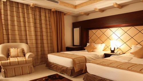 מיטה או מיטות בחדר ב-Lavande Suites