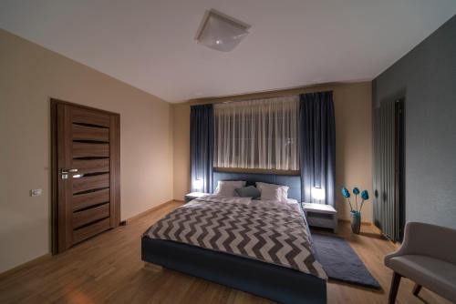 Postel nebo postele na pokoji v ubytování Natura Villa Spa