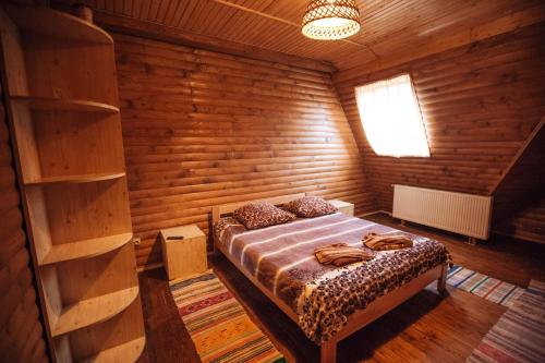 Postel nebo postele na pokoji v ubytování Apartments in Polyana