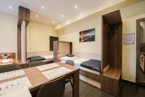 Posteľ alebo postele v izbe v ubytovaní Apartments Danube