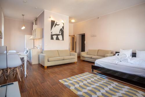Postel nebo postele na pokoji v ubytování Old Town Studio Apartment - Uus street 24