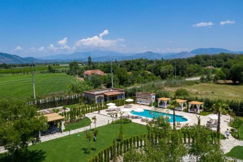 an aerial view of a resort with a swimming pool at Zigo's Hotel in Mugla