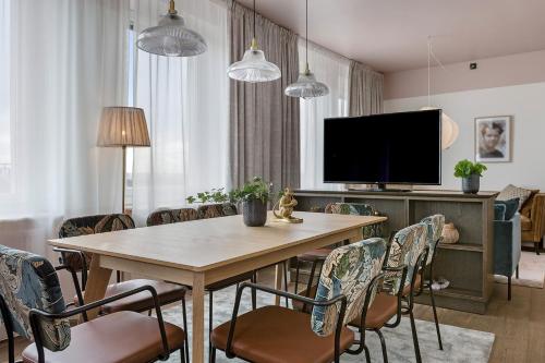 a dining room with a table and chairs at Hotel Giò; BW Signature Collection in Solna